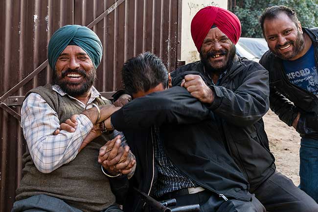 Group of friends laughing.