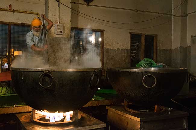 Cooking for the temple Visitors.