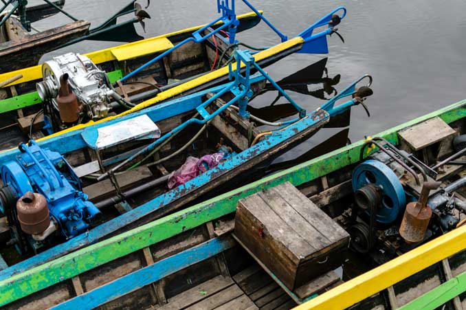 A row of boat engines lined up.