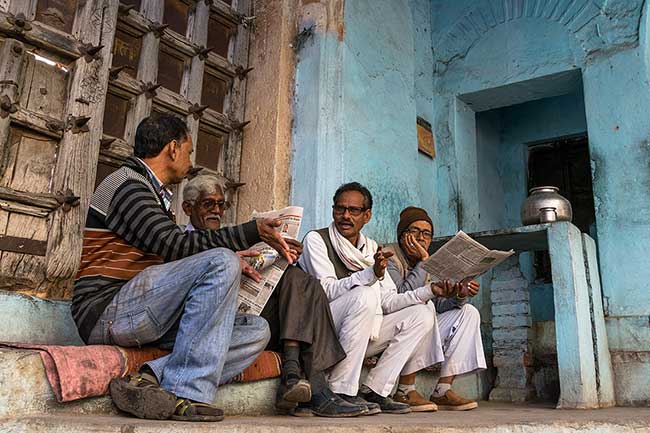 Men enjoying their morning tea.