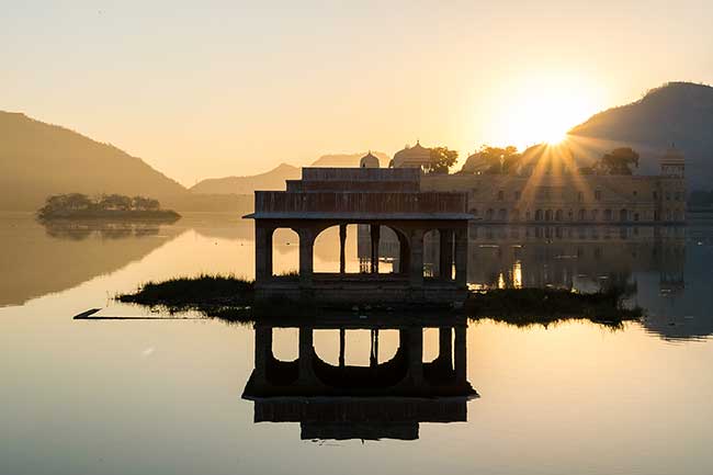 Sunrise peaking over the water temple.