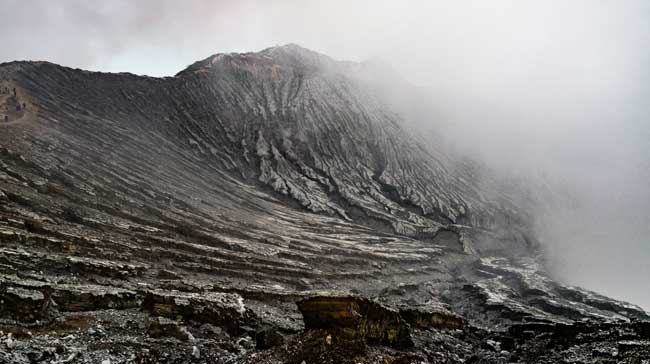 Sulfur fumes seeping up from the Ijen crater.