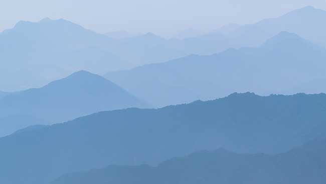 Layers of blue mountains.