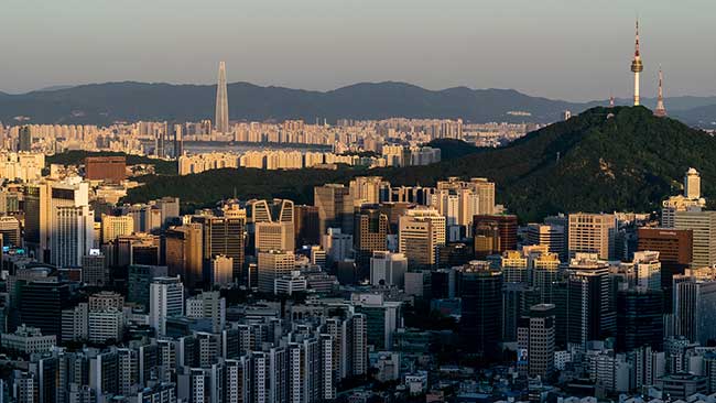 Namsan Tower with Lotte World Tower in background.