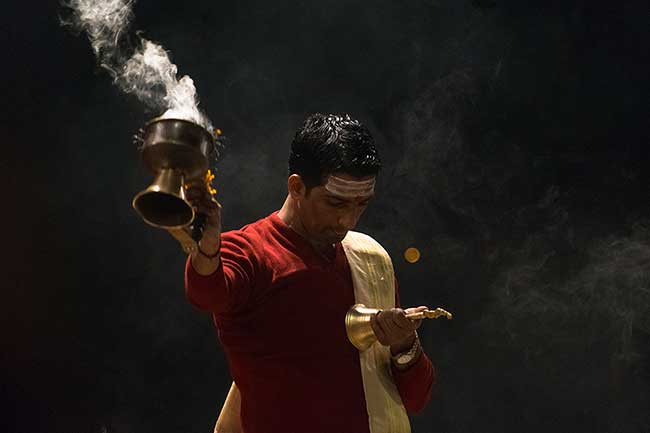 Hindu priest during evening aarti.