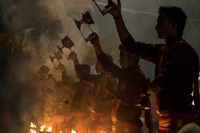 Hindu priests during the morning aarti.